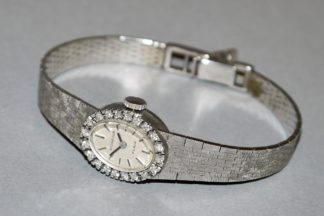 1006-Damenarmbanduhr Dugena, Gold mit Brillanten