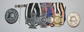 1093-Dreiteilige Ordensspange Oldenburg, Miniaturnadel u. Verwundetenabzeichen in Schwarz und Silber, Kaiserreich 1914-1915